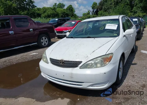 2002 Toyota Camry Le z USA, uszkodzony, nr VIN 4T1BE32K32U036878